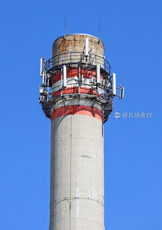 Smoke stack of the power station with antennas